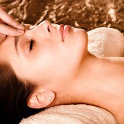 Women receiving a facial massage acupressure face massage